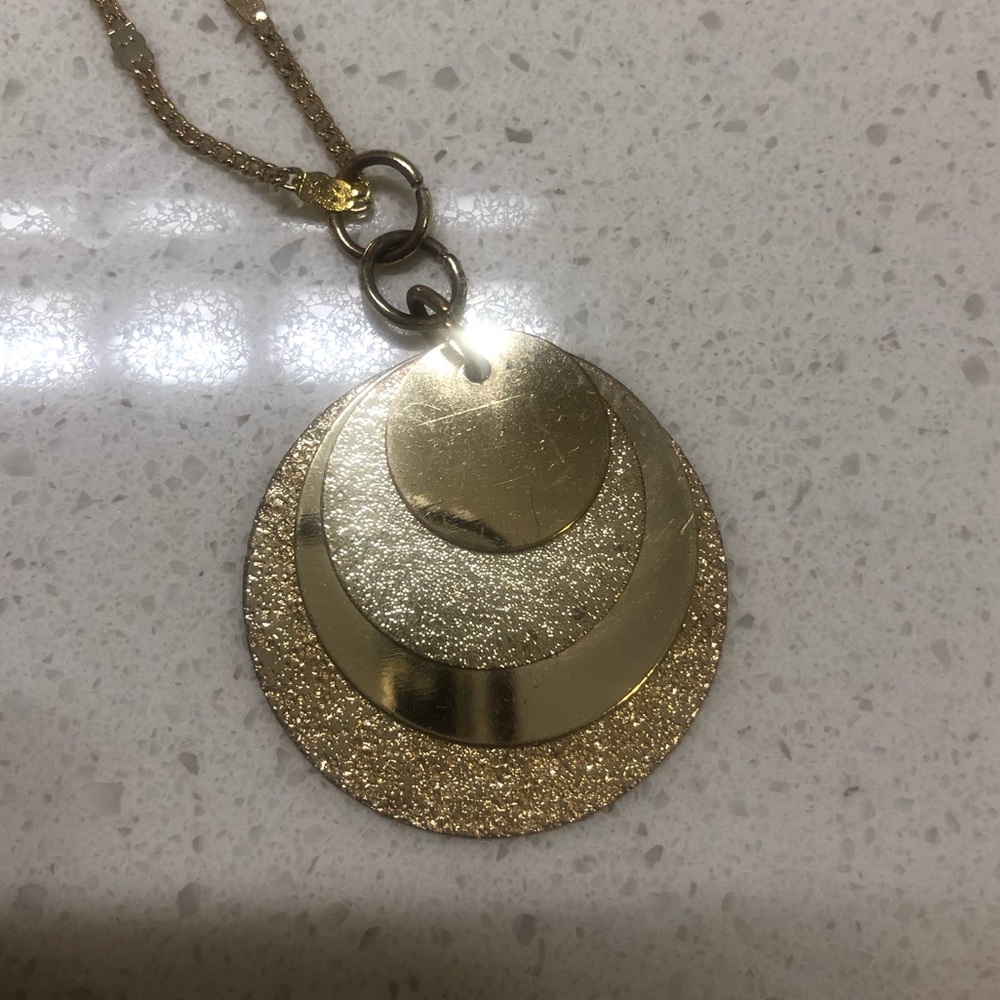 Long gold necklace